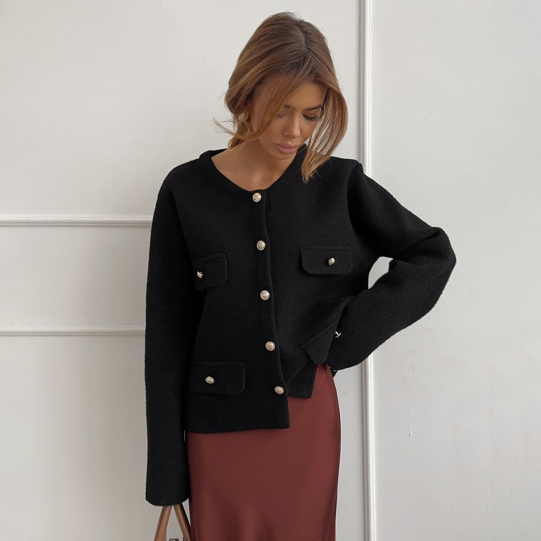 Ladies elegant short jacket with functional pockets and chic button details and style