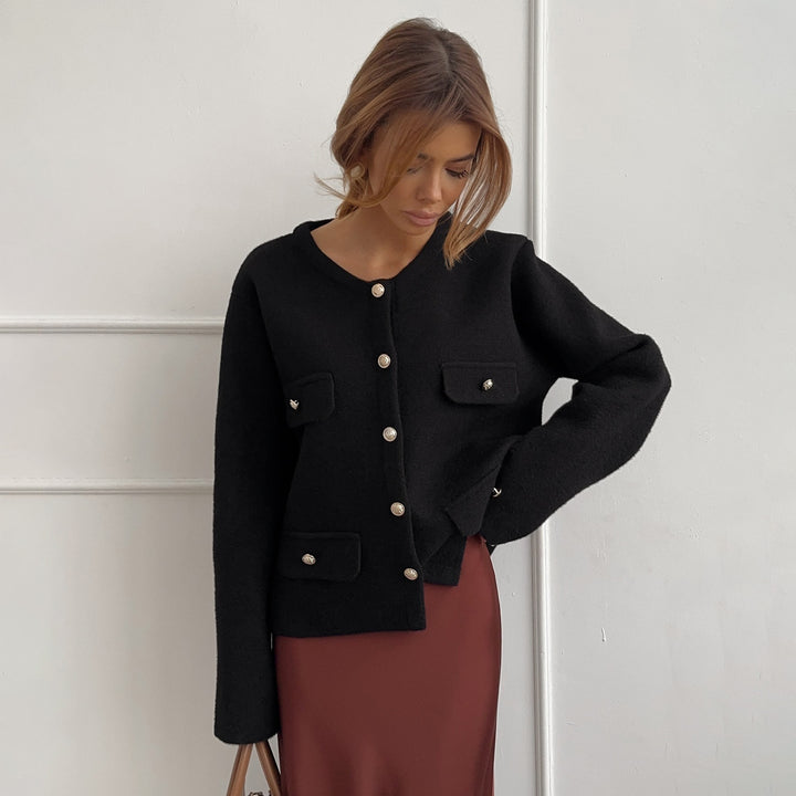 Ladies elegant short jacket with functional pockets and chic button details and style