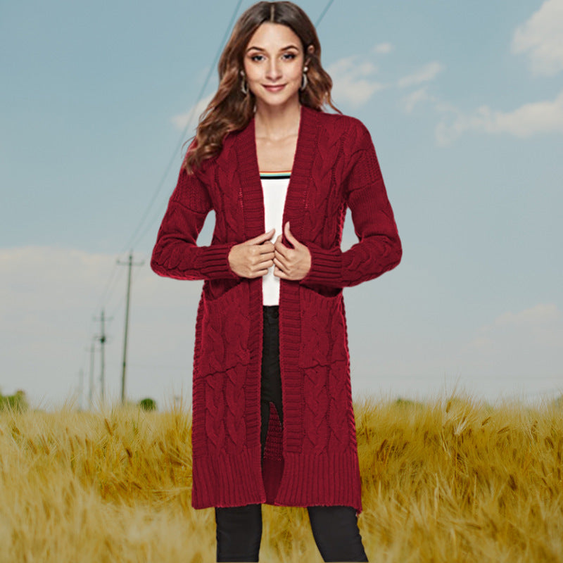 Knitted cardigan for women with a modern weaving pattern and practical pockets Lune London