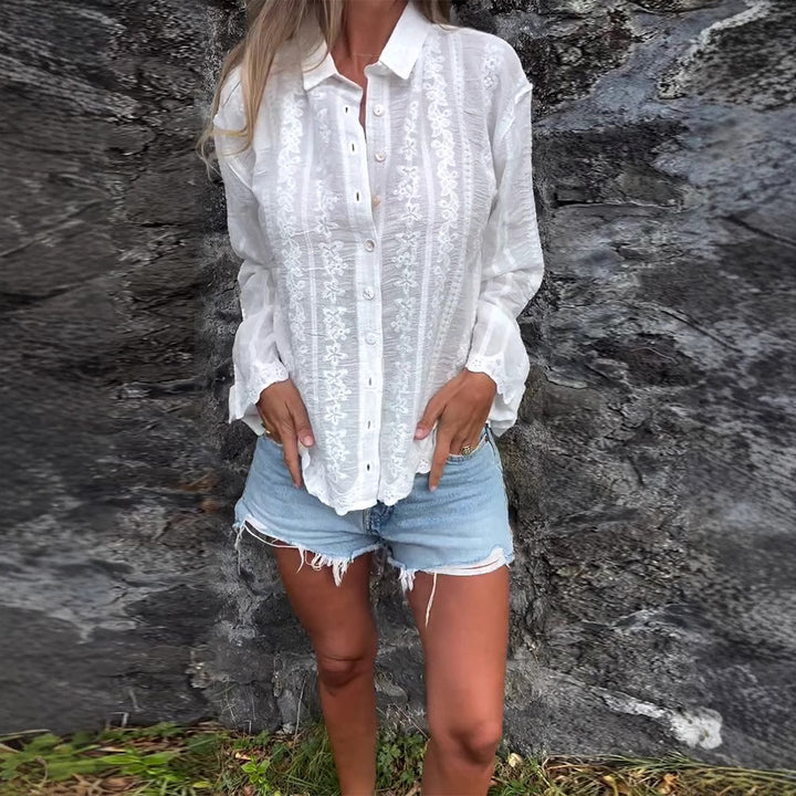 Blouse femmes avec broderie florale et tissu texturé Chic & Stil
