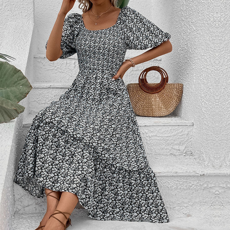 Maxi dress for women with floral print and crossed back detail Lune London