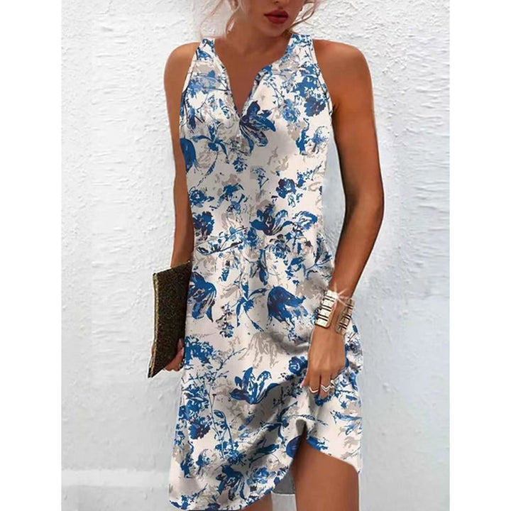 Elegant summer dress for women with deep V-neck and seductive pattern Lune London