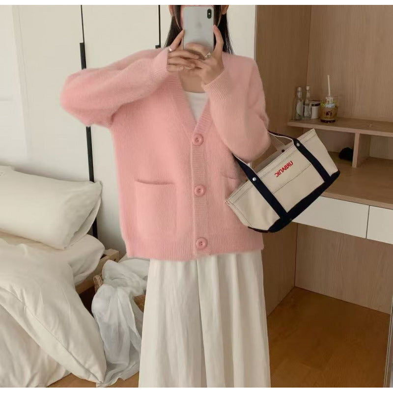 Cardigan pelucheux à boutons pour femmes avec poches élégantes Chic & Stil