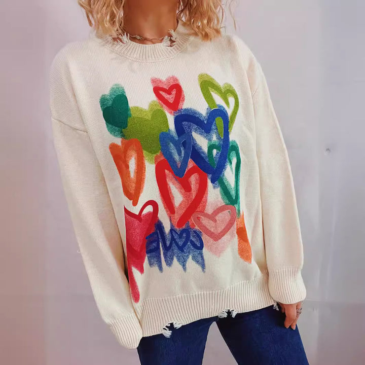 Pull décontracté pour dames avec un design de cœur coloré Chic & Stil