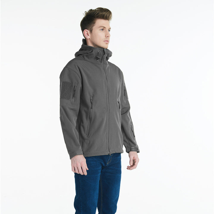 Tactical softshell jacket for men with numerous zipped pockets and an adjustable hood collar Lune London