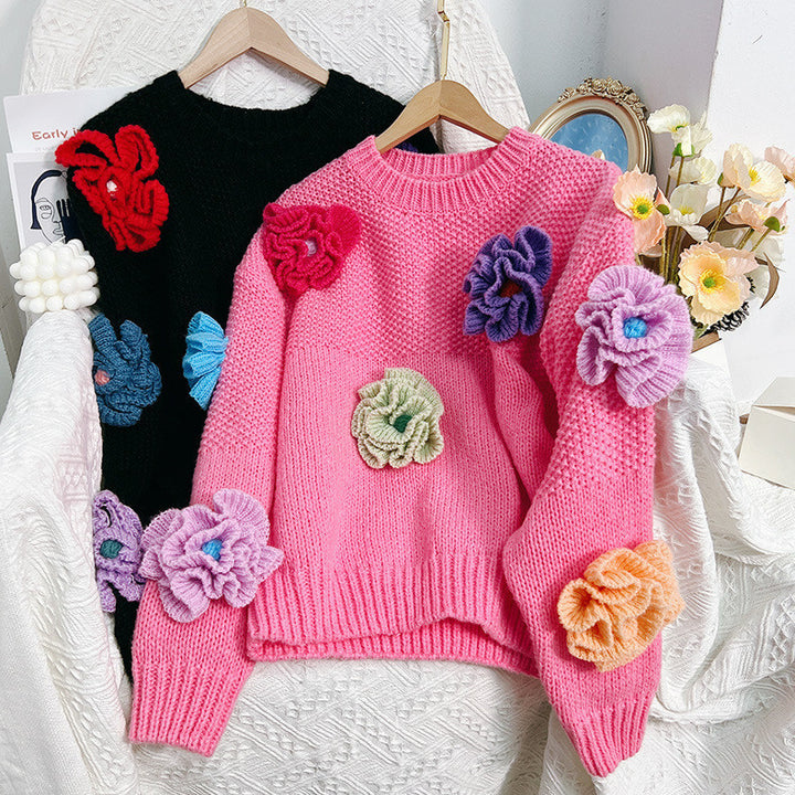 Women’s knitted sweater with chic floral appliqués and style