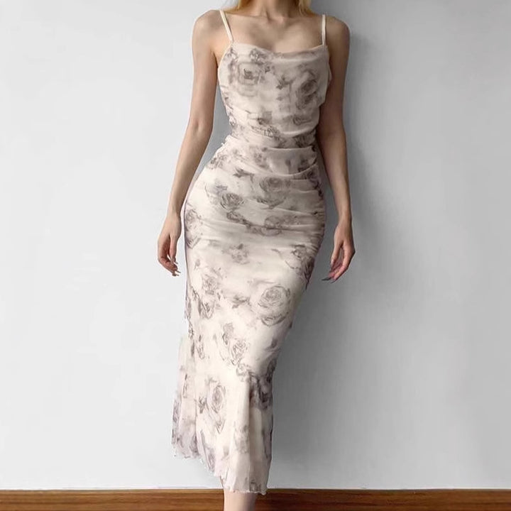 Maxi fitted dress for women with refined ruffles and a floral pattern Lune London