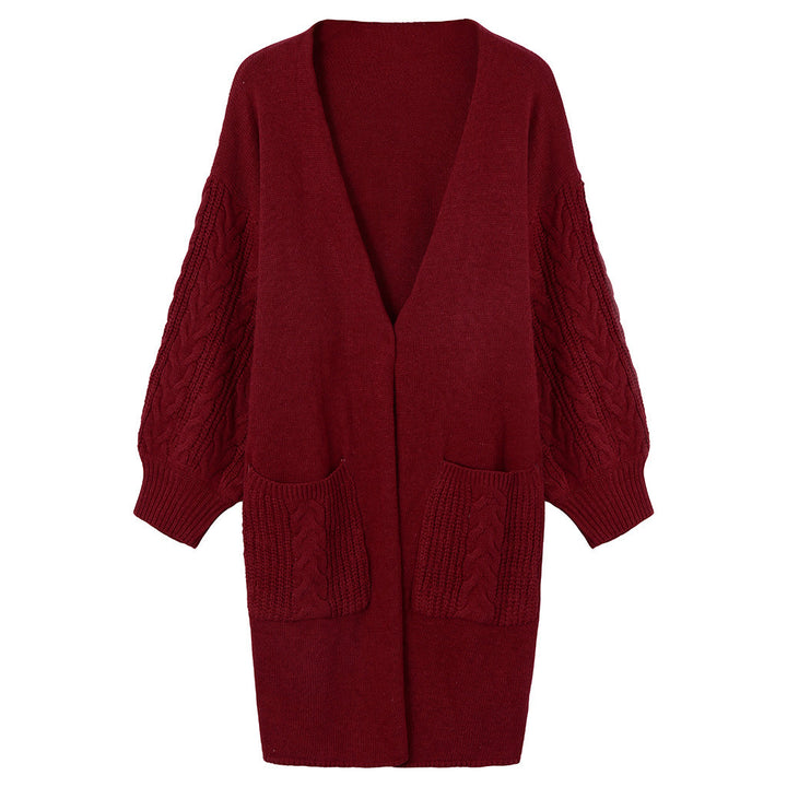 Knitted coat for women with deep V-neck and chunky knit details Lune London