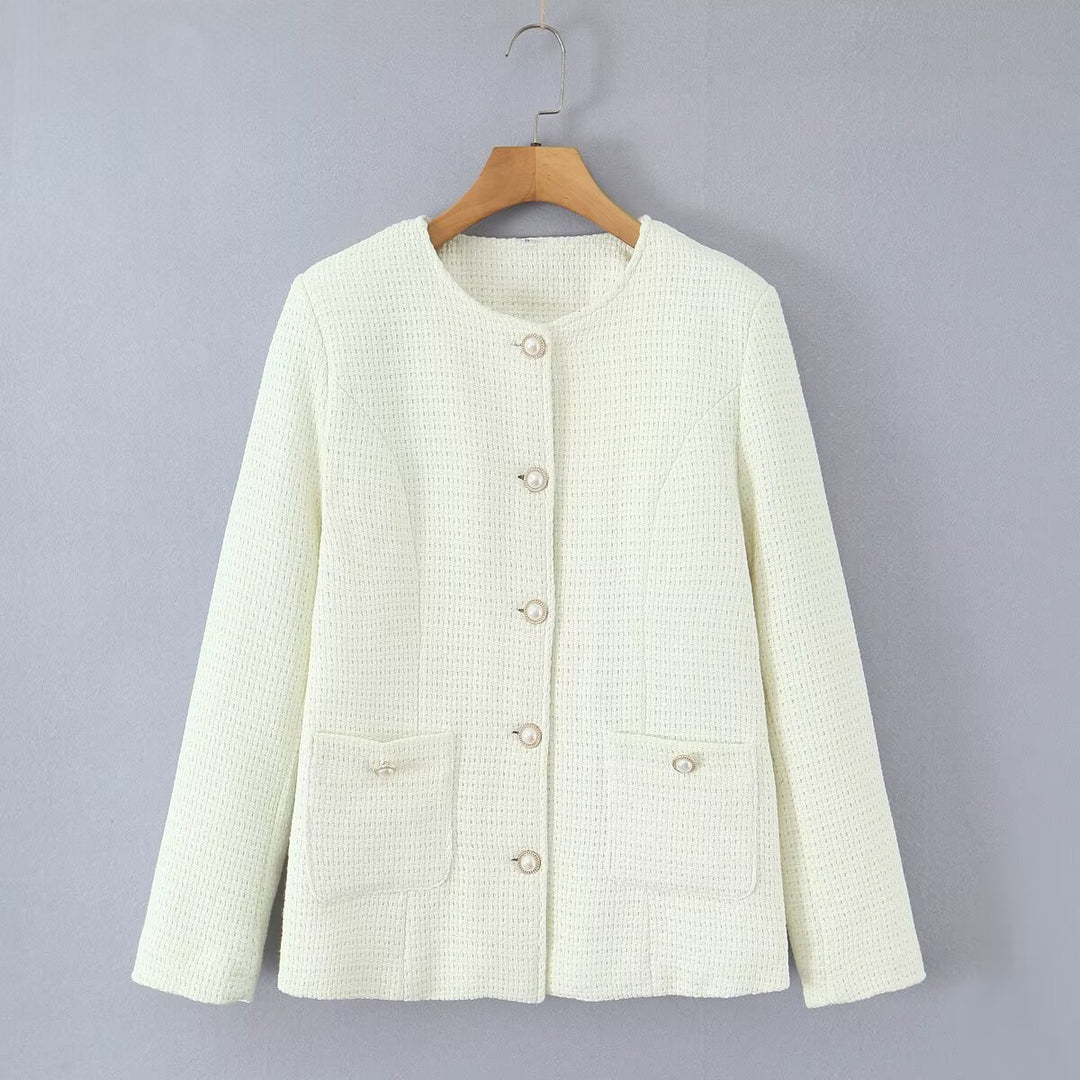 Ladies elegant knitted vest with textured design and pearl buttons Lune London