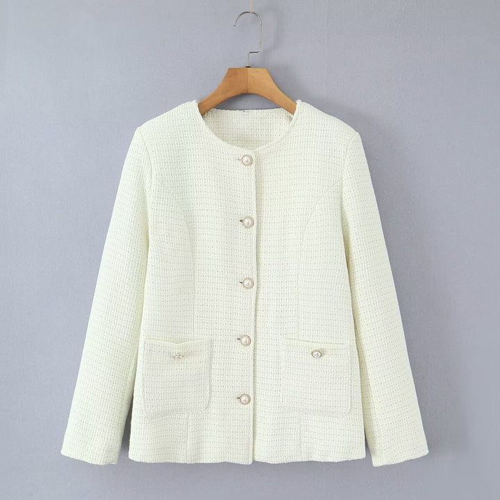 Ladies elegant knitted vest with textured design and pearl buttons Lune London
