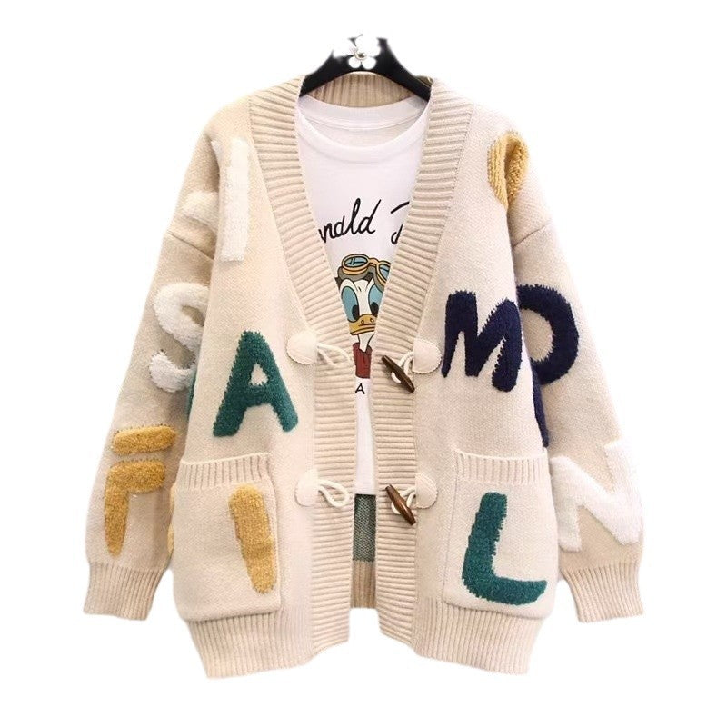 Ladies chunky knit cardigan with colorful appliqués and large pockets Lune London