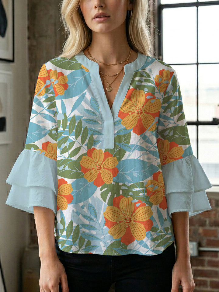 Ladies elegant blouse shirt with voluminous puff sleeves and graphic floral design Lune London