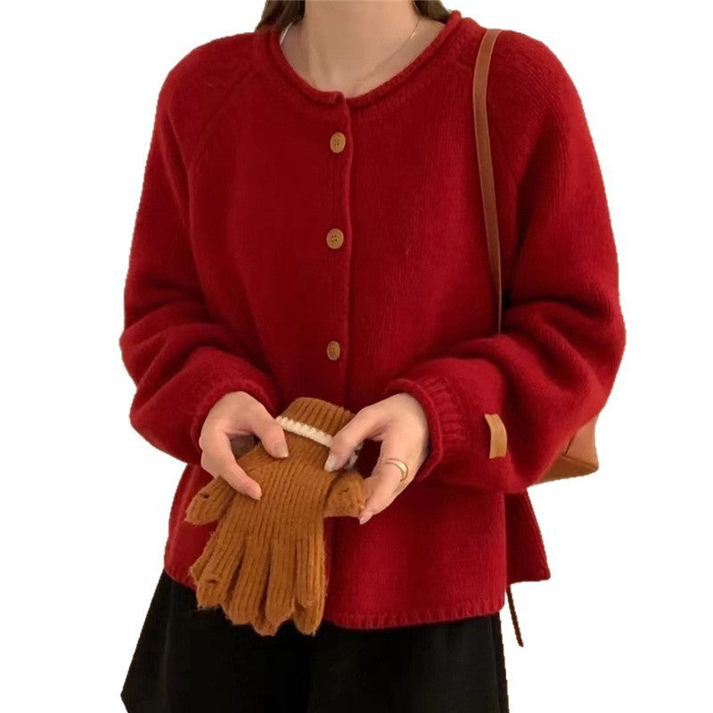 Knitted jacket for women with asymmetrical cut and generous balloon sleeves Lune London