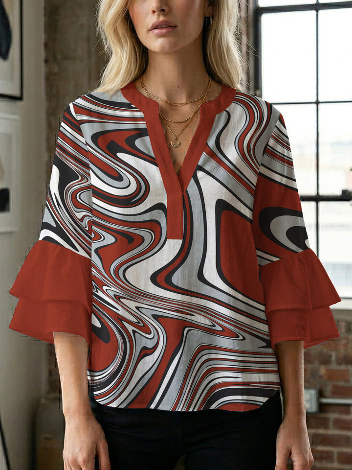 Women's blouse with voluminous wing sleeves and intense leaf pattern Lune London