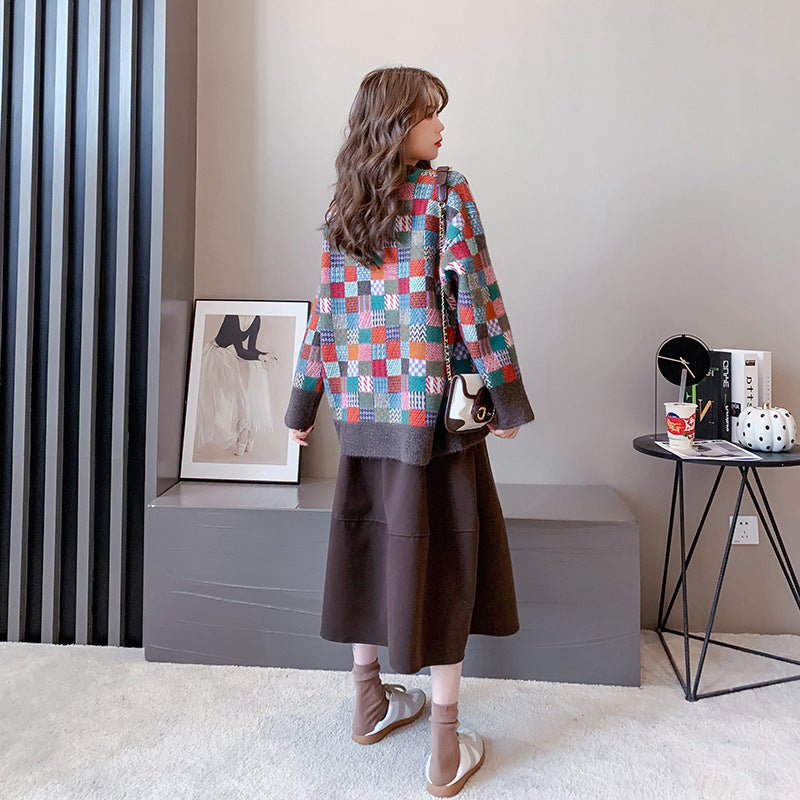 Pull féminin élégant avec motif à carreaux et coupe décontractée Chic & Stil