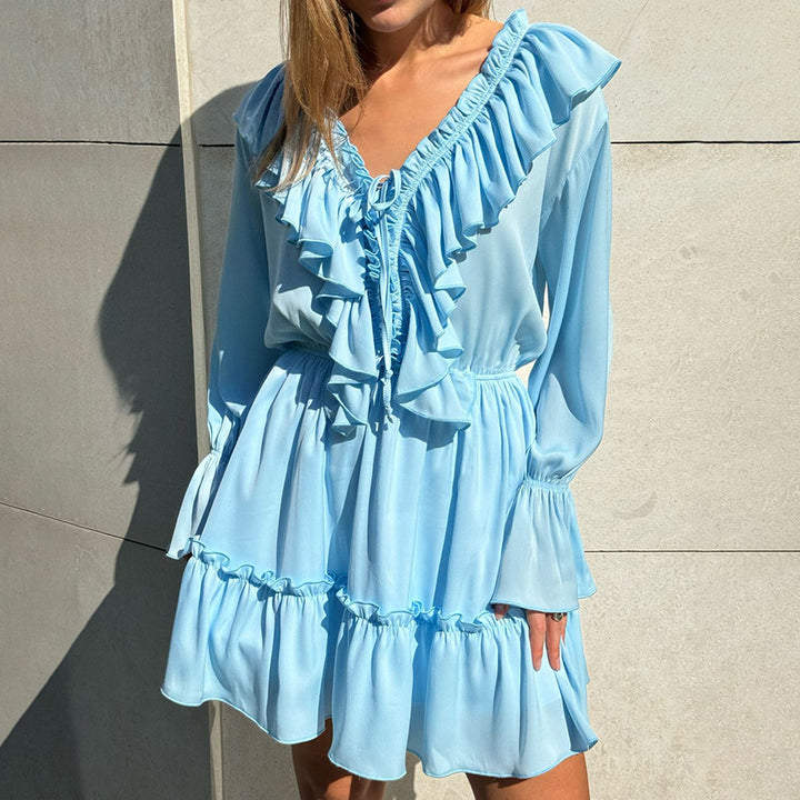 Playful ruffled dress for women with V-neckline and puff sleeves Lune London