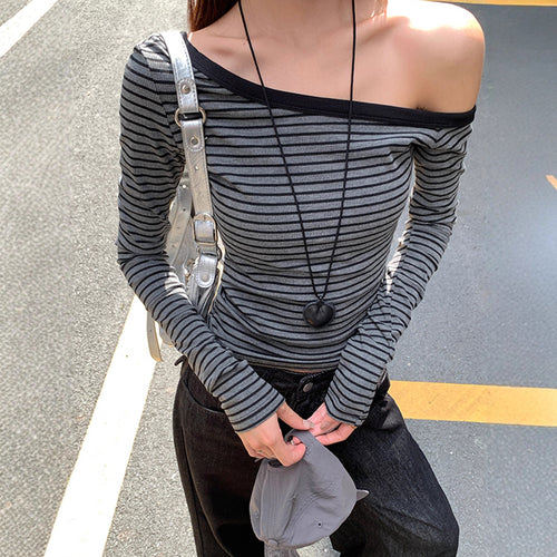 Women's asymmetrical long sleeve shirt with stylish stripes Chic & Stil