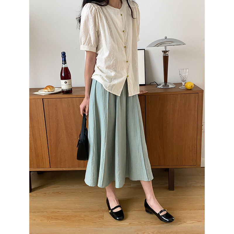 Women's airy blouse with puff sleeves and button details Chic & Stil