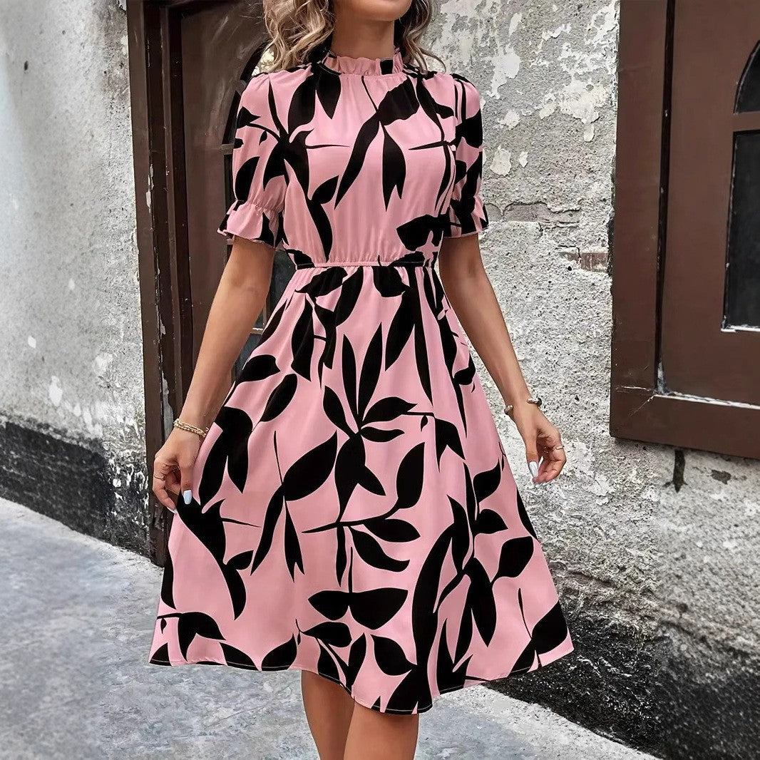 Robe midi élégante pour femmes avec motif de plantes stylé et taille élastique Chic & Stil