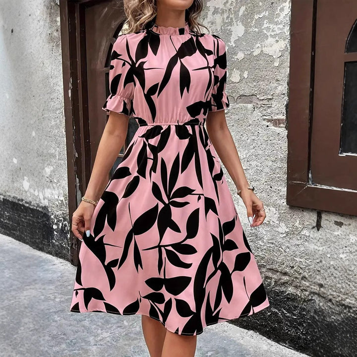 Robe midi élégante pour femmes avec motif de plantes stylé et taille élastique Chic & Stil