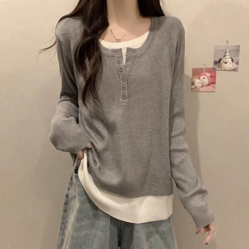 Pull long à manches longues tendance pour femme avec patte de boutonnage Chic & Stil