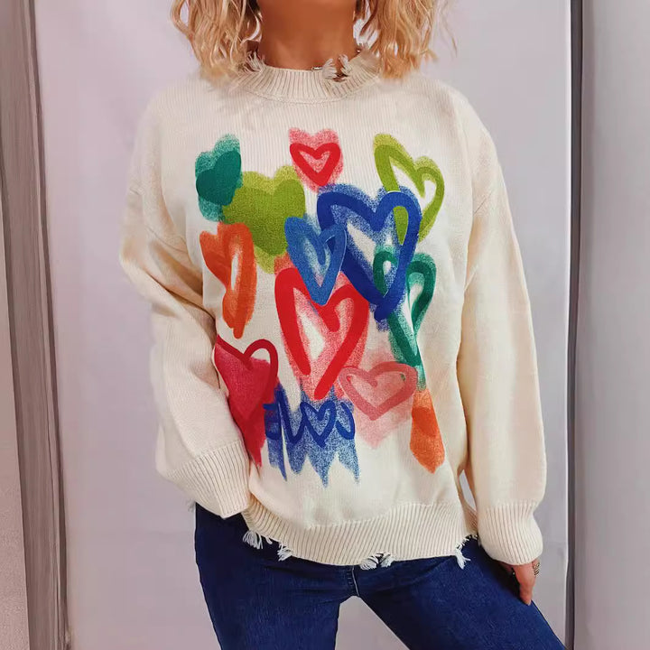 Pull décontracté pour dames avec un design de cœur coloré Chic & Stil