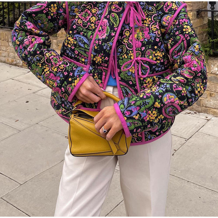 Ladies trendy quilted jacket with floral pattern and practical pockets Lune London
