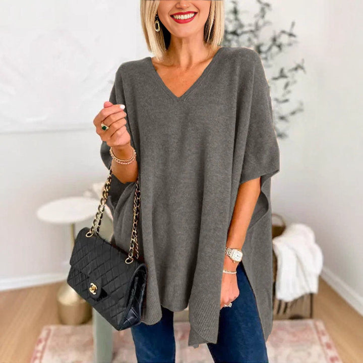 Casual knitted poncho for women with V-neck and oversized fit Lune London