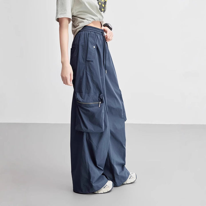Functional cargo pants for women with elastic waist and practical zip pockets Lune London
