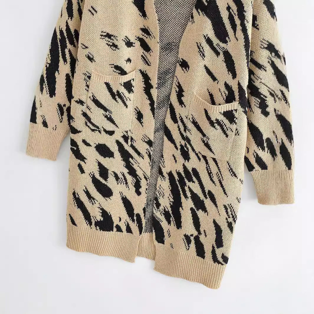 Ladies chunky knit cardigan with trendy leopard print and practical pockets Lune London