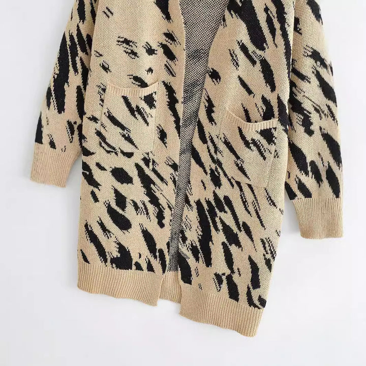 Ladies chunky knit cardigan with trendy leopard print and practical pockets Lune London