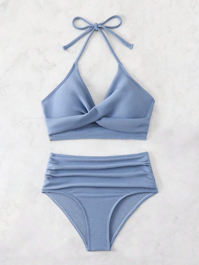 High-waisted women's bikini with an elegant draped top and a playful design Lune London