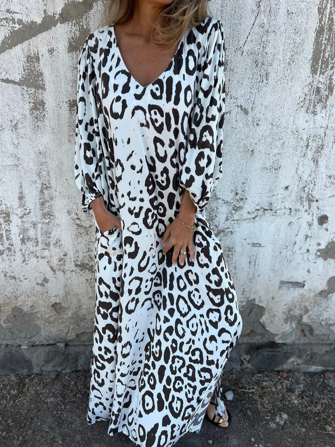 Maxi dress for women with an exclusive leopard pattern and practical side pockets Lune London