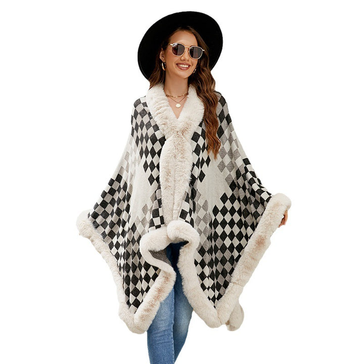 Elegant knitted poncho for women with luxurious faux fur insert and geometric pattern Lune London