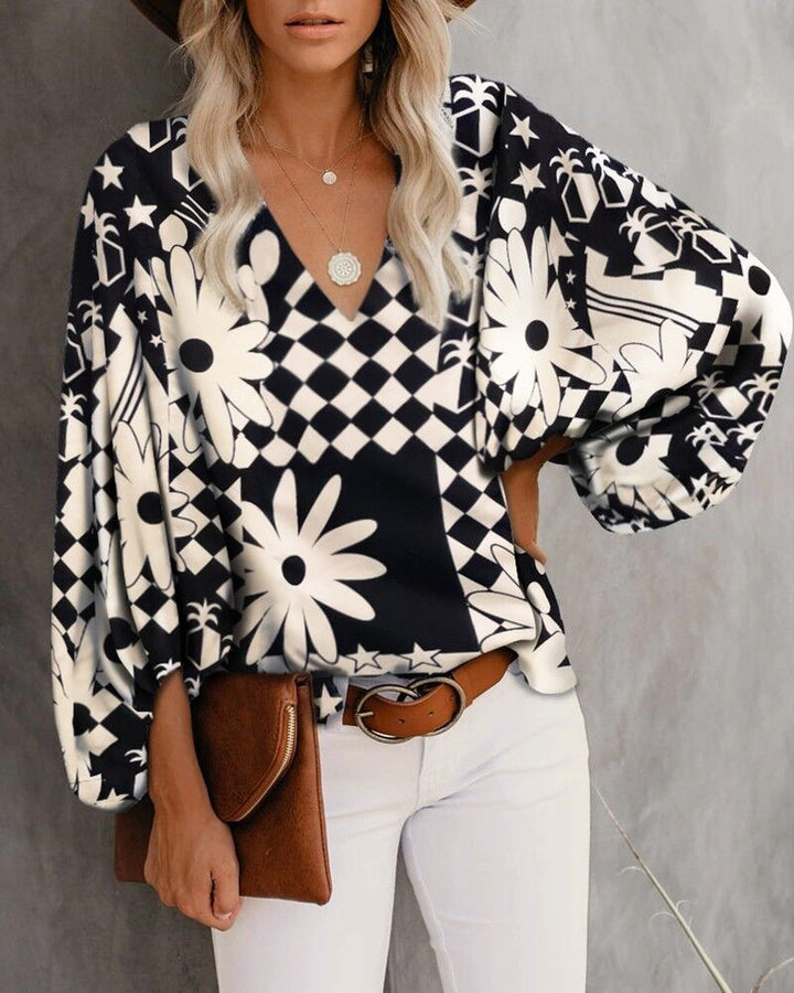Blouse féminine à la mode avec des manches larges et un col en V Chic & Stil