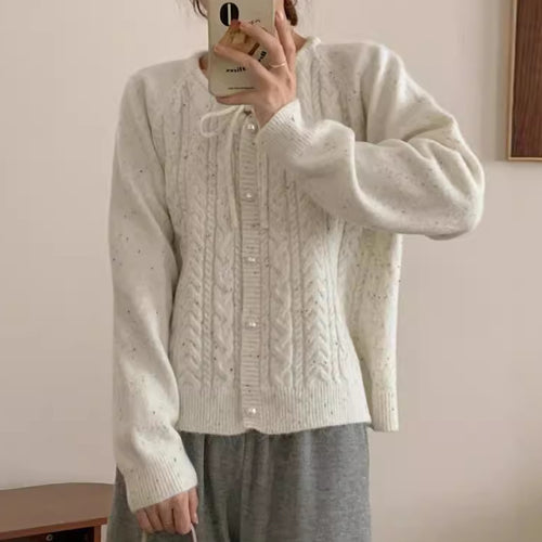 Chunky knit jacket for women with elegant pearl buttons and a structured design Lune London