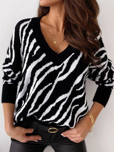 Pull pour femmes en tricot avec décolleté en V profond et motif zèbre Chic & Stil