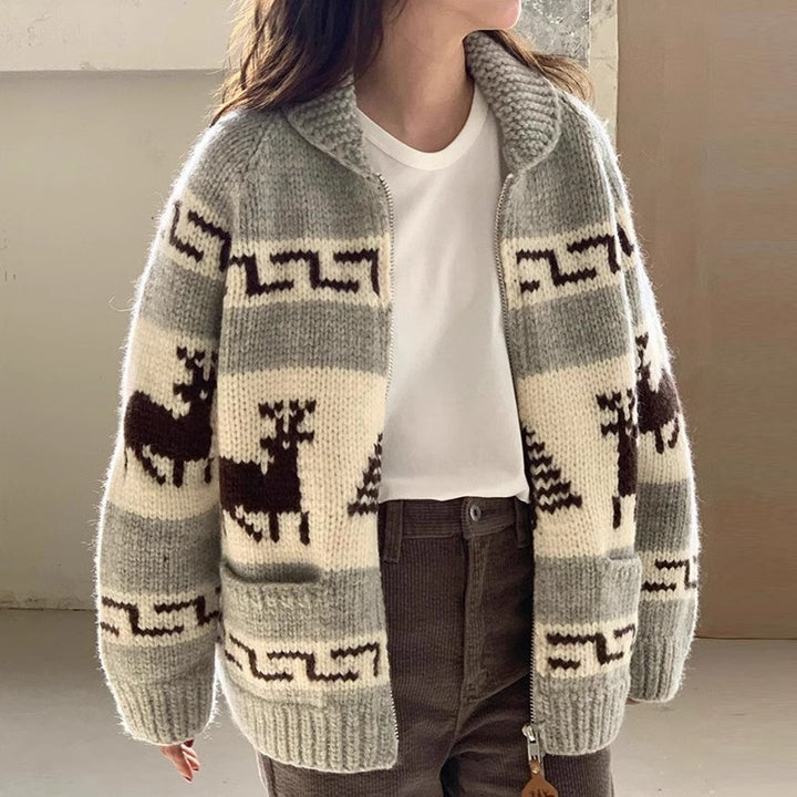 Women's cardigan with festive reindeer pattern and practical pockets Lune London
