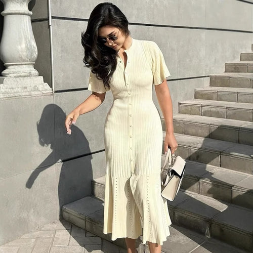 Midi dress for women with an elegant ruffled hem and a fine button detail Lune London