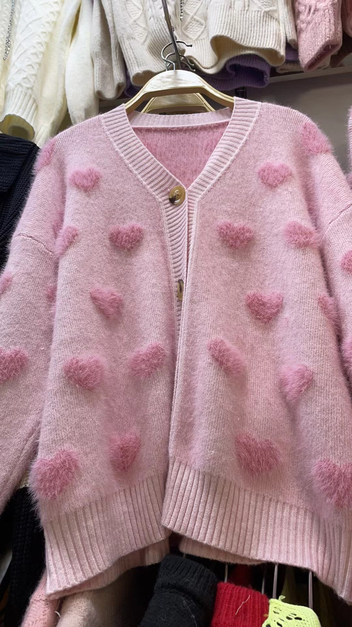 Sweater vest for women in cozy knit with heart shape design and button detail Lune London