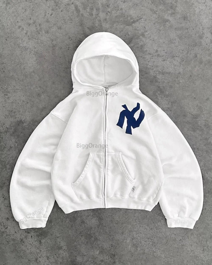 Sweat à capuche femme avec coupe oversize et poche kangourou pratique Chic & Stil