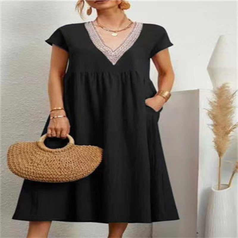 Robe maxi femme avec un élégant décolleté en V et des poches latérales Chic & Stil