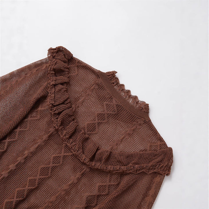 Ladies soft knit top with ruffle details and button placket Lune London