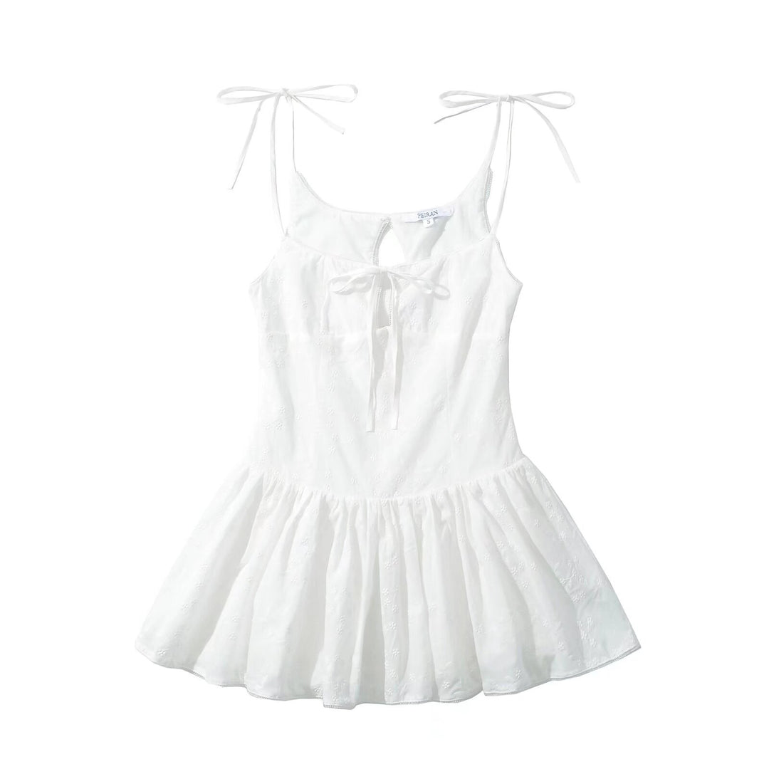 Airy summer dress for women with adjustable spaghetti straps and ruffled hem Lune London