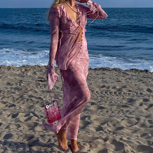 Elegant maxi dresses with cutouts for women featuring fluid fabric and refined ruffle details Lune London