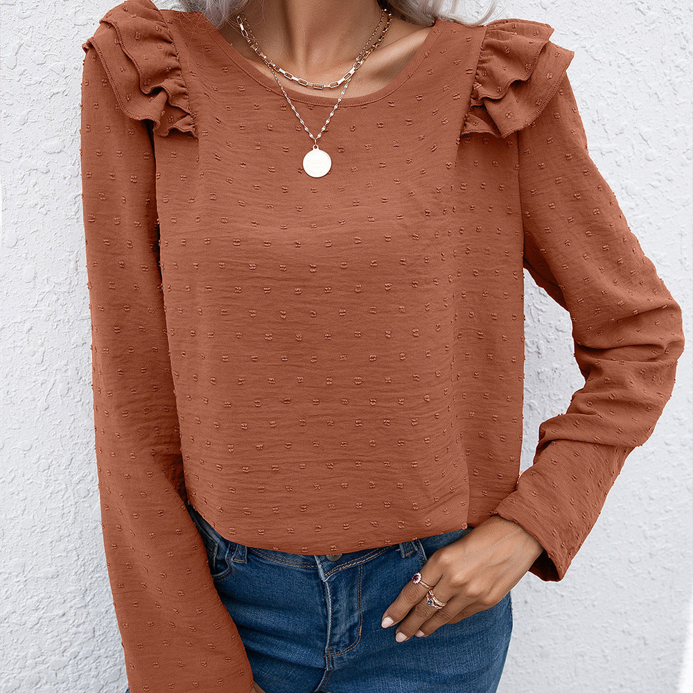 Casual women's top with ruffle details and textured surface Lune London
