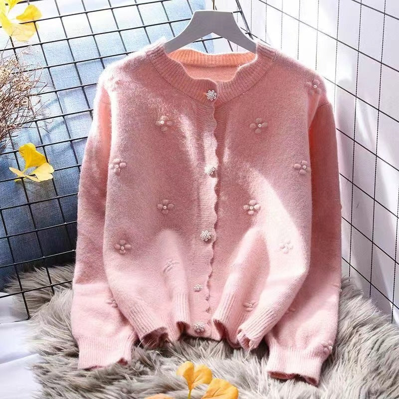 Cardigan féminin confortable avec des appliqués floraux Chic & Stil