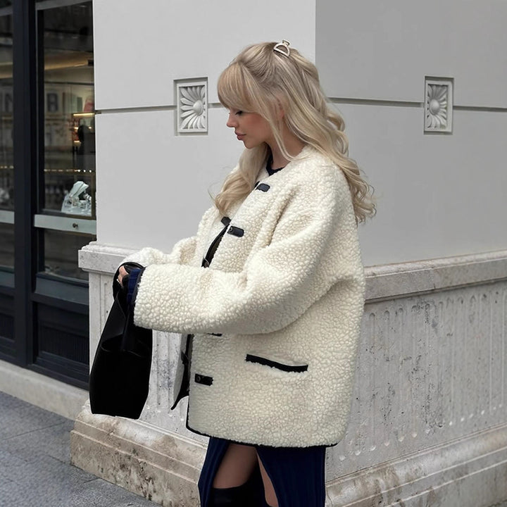 Faux fur jacket for women with a modern cut and practical button details Lune London