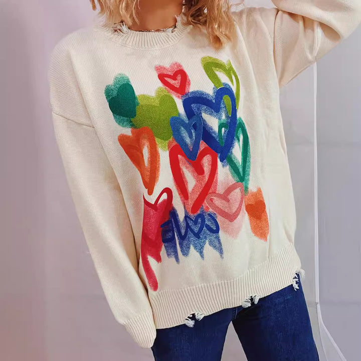 Pull décontracté pour dames avec un design de cœur coloré Chic & Stil