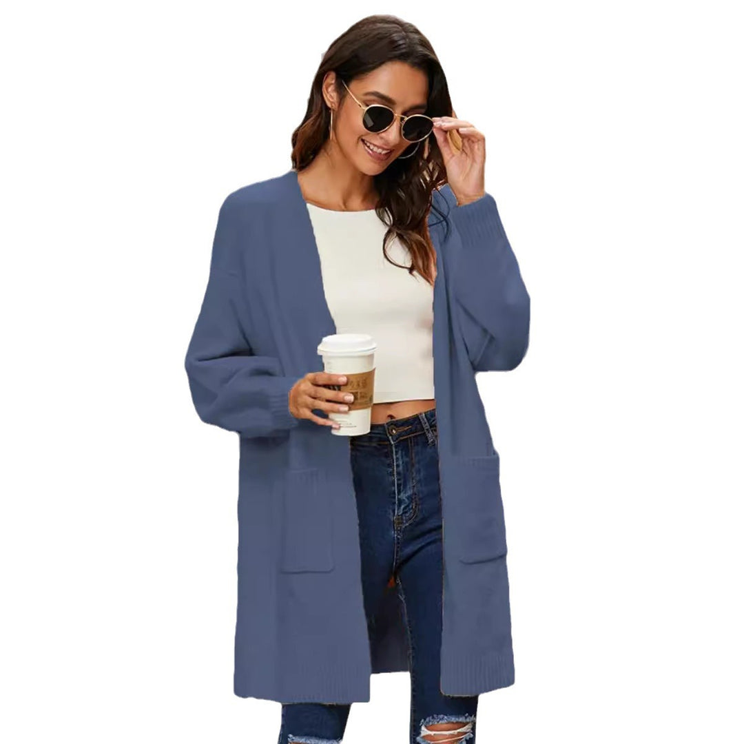 Knit coat for women with oversized and comfortable sleeves and practical pockets Lune London